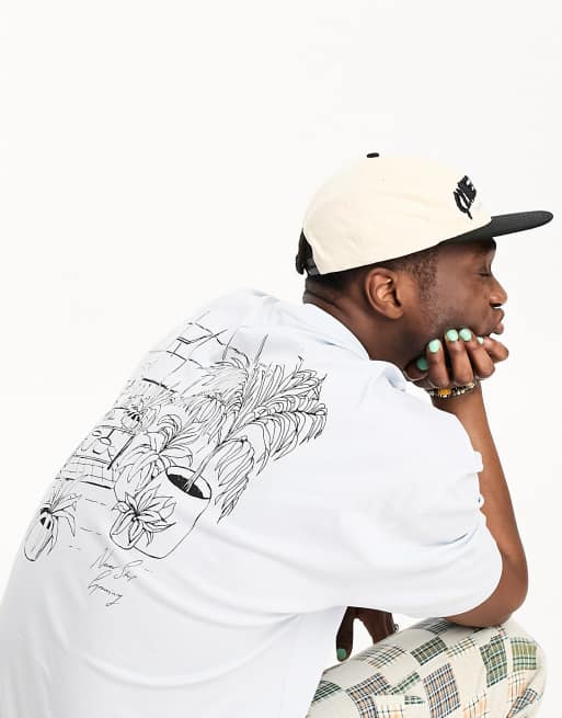 ASOS Design oversized t-shirt in white with greenhouse print