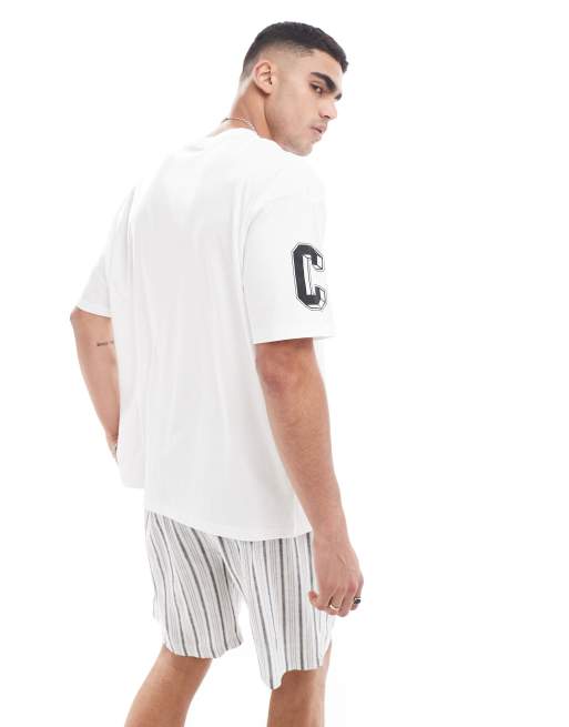 ASOS DESIGN oversized t-shirt in white with multi placement print, 4 of 4