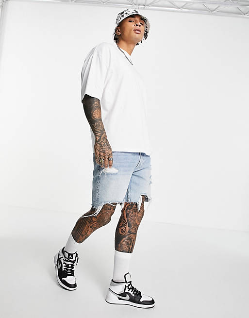 Men oversized t-shirt in white with multi placement print 