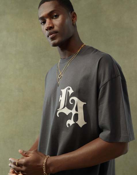 ASOS DESIGN - Oversized T-shirt med by-tekstprint foran i sort - view 1