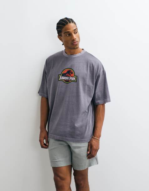 ASOS DESIGN oversized t-shirt med Jurassic Park T-Rex-tryck i washed black - view 1