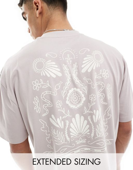 FhyzicsShops DESIGN - Oversized T-shirt met astrologische print op de achterkant in oudroze