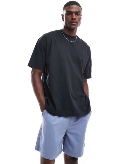 ASOS DESIGN - Oversized T-shirt met camouflageprint op de achterkant in zwart, 3 van 4