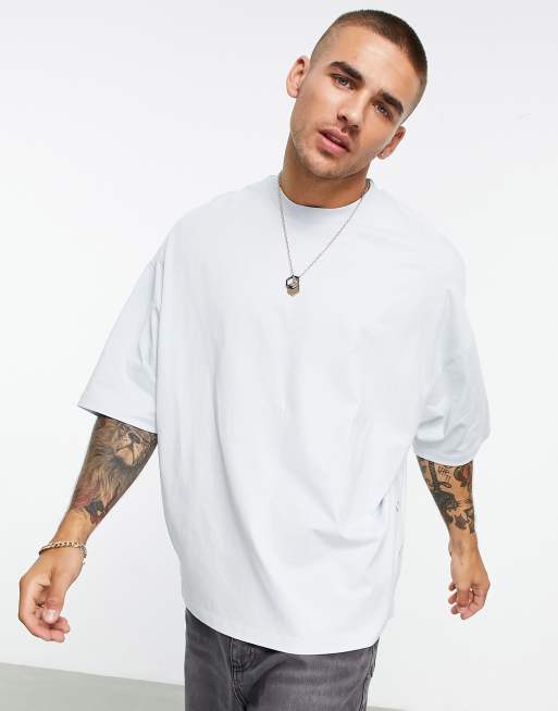 ASOS DESIGN - Oversized T-shirt met drukknopen aan de zijkant in blauw
