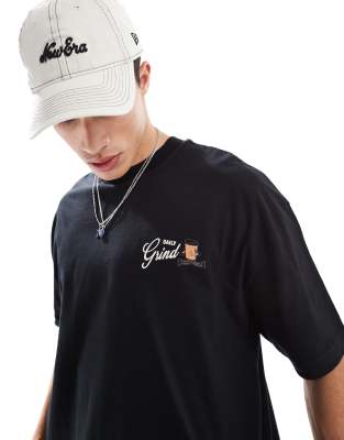 ASOS DESIGN oversized t-shirt with cartoon graphic in black