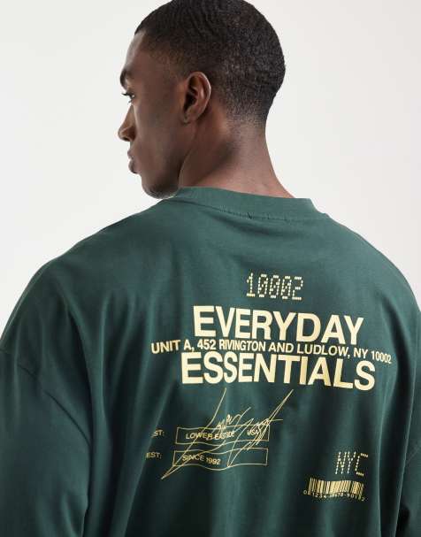 ASOS DESIGN - Oversized T-shirt met grafische 'Everyday Essentials' tekstprint in groen - view 1