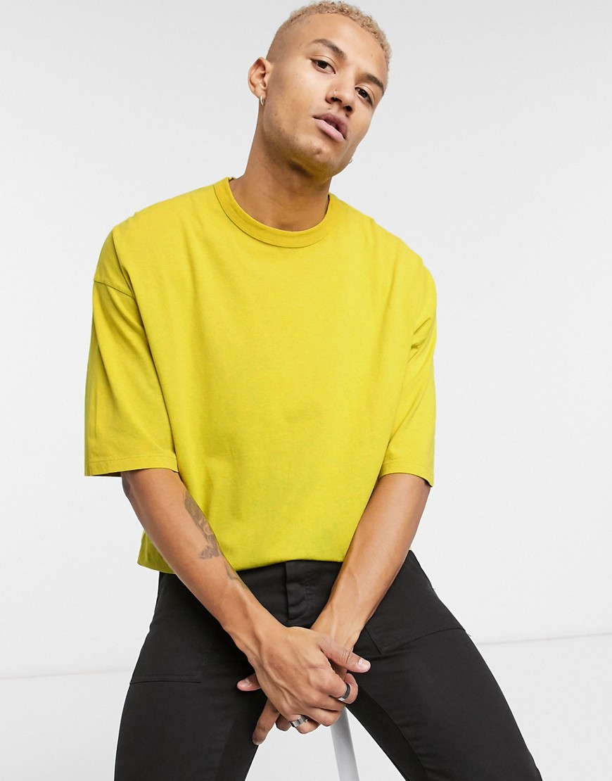 ASOS DESIGN - Oversized T-shirt met halflange mouwen in gele acid wash-Geel