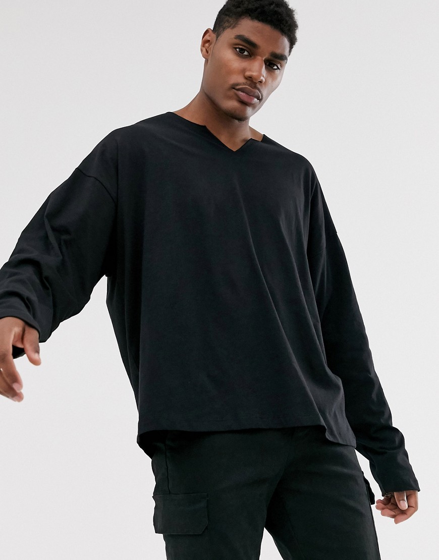 ASOS DESIGN - Oversized T-shirt met lange mouwen en onafgewerkte halslijn met inkeping in zwart