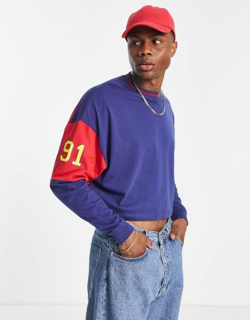 ASOS DESIGN - Oversized T-shirt met lange mouwen, 'London'-stadsprint en kleurvlakken in marineblauw en rood