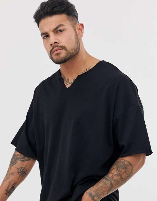 ASOS DESIGN - Oversized T-shirt met onafgewerkte hals met inkeping in zwart