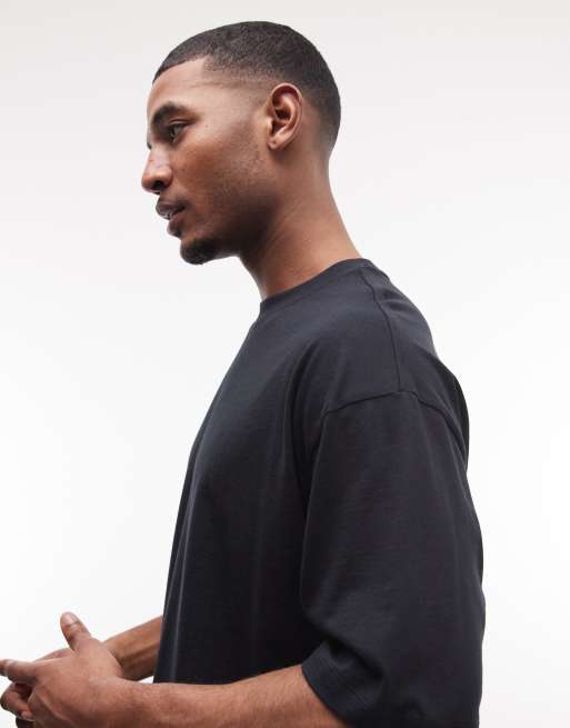 ASOS DESIGN - Oversized T-shirt met Paraiso-print op de voorkant in zwart, 5 van 5