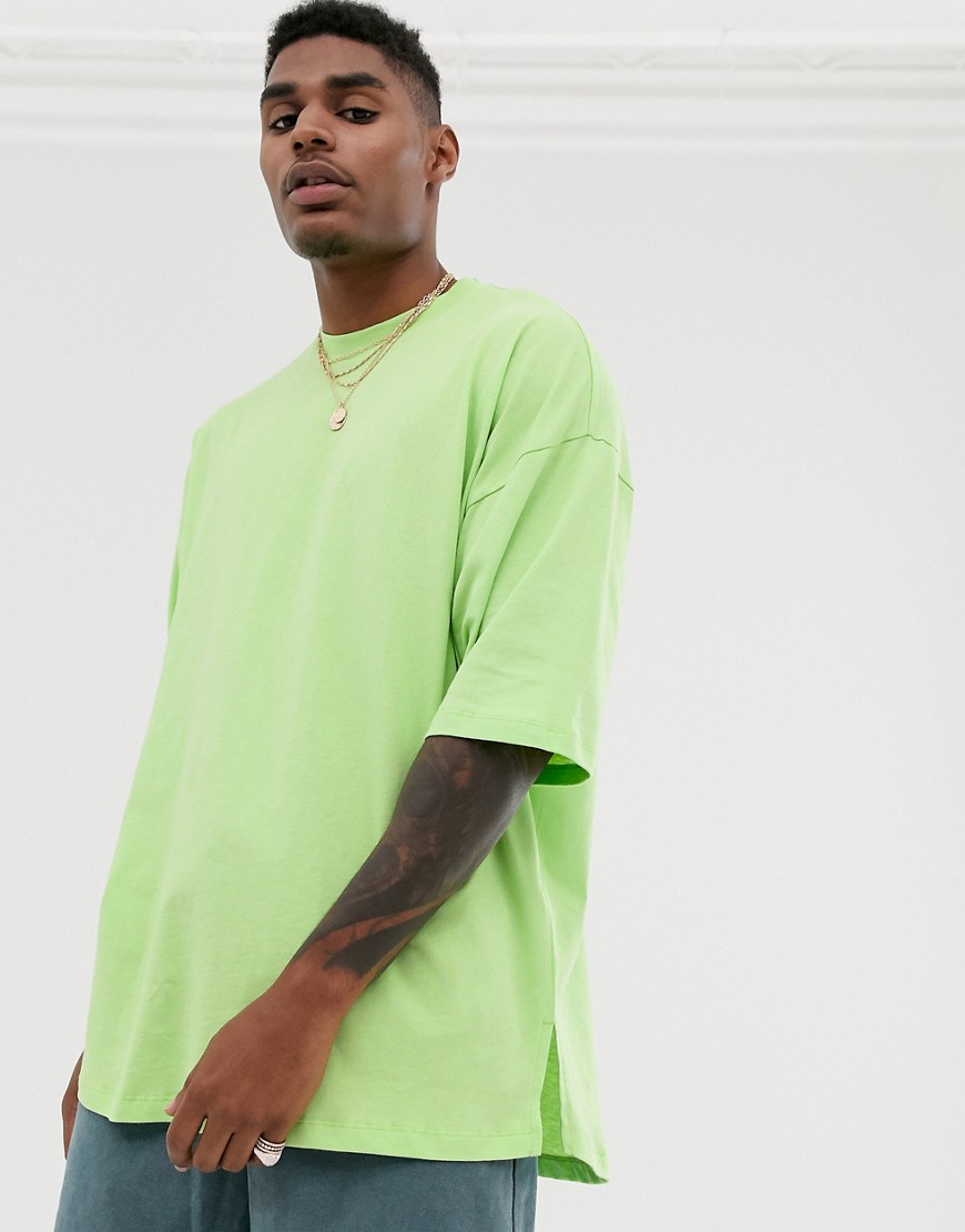 ASOS DESIGN - Oversized T-shirt met splitjes aan de zijkant in groen