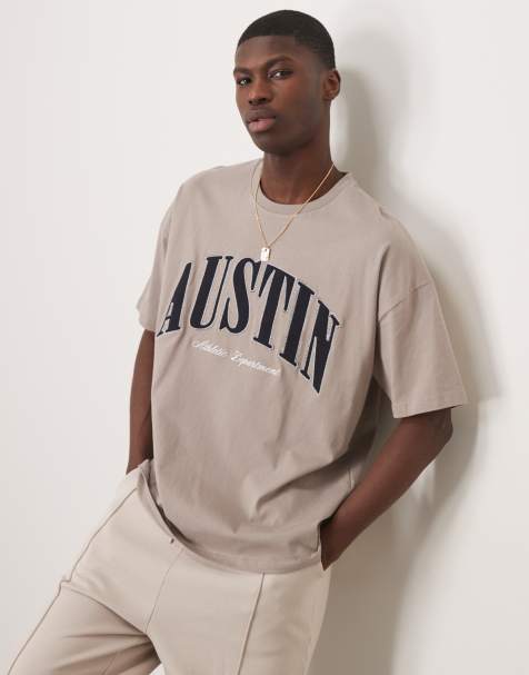 ASOS DESIGN - Oversized T-shirt met verlaagde schouders en stadsprint op de borst in bruin - view 1