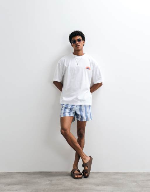ASOS DESIGN - Oversized T-shirt met zomers borduursel op de borst in wit, 2 van 7
