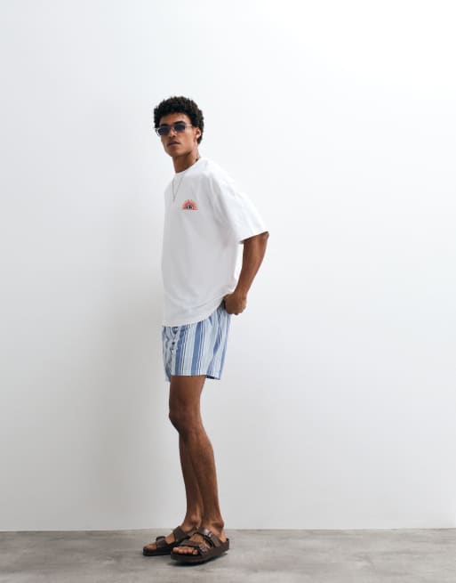 ASOS DESIGN - Oversized T-shirt met zomers borduursel op de borst in wit, 4 van 7