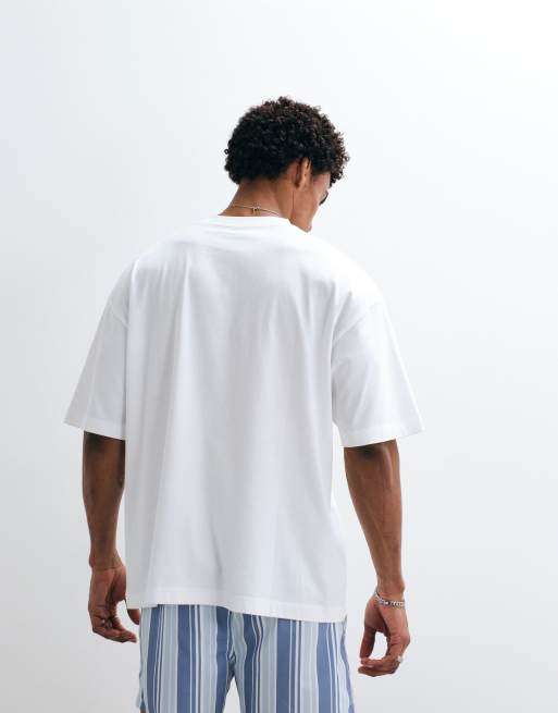 ASOS DESIGN - Oversized T-shirt met zomers borduursel op de borst in wit, 5 van 7