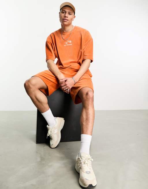 ASOS DESIGN - Oversized T-shirt van geribbeld velours in oranje met borduursel, deel van co-ord set