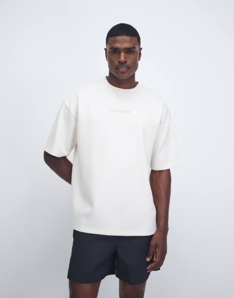 ASOS DESIGN - Oversized T-shirt van zware stof met geborduurde tekst in gebroken wit - view 1