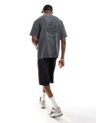 ASOS DESIGN - Oversized T-shirt van zware stof met print in zwart met wassing 