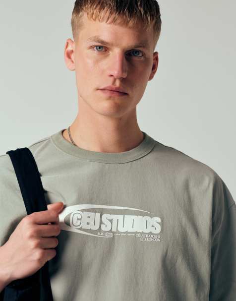 ASOS DESIGN - Oversized T-shirt van zware stof met print op de voorkant in kaki met wassing - view 1
