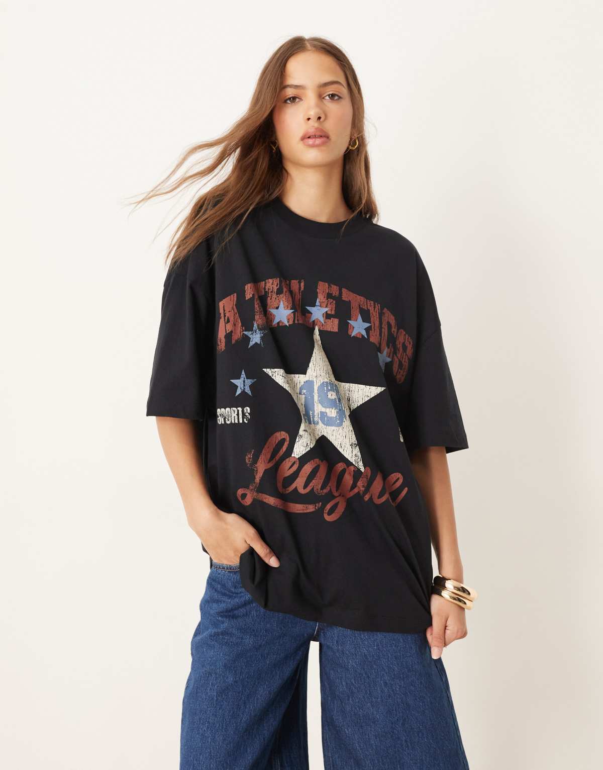 ASOS DESIGN oversized t-shirt with athletics league graphic in black