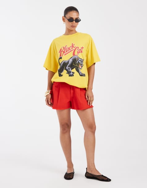 ASOS DESIGN oversized T-shirt with black cat graphic in yellow - view 1
