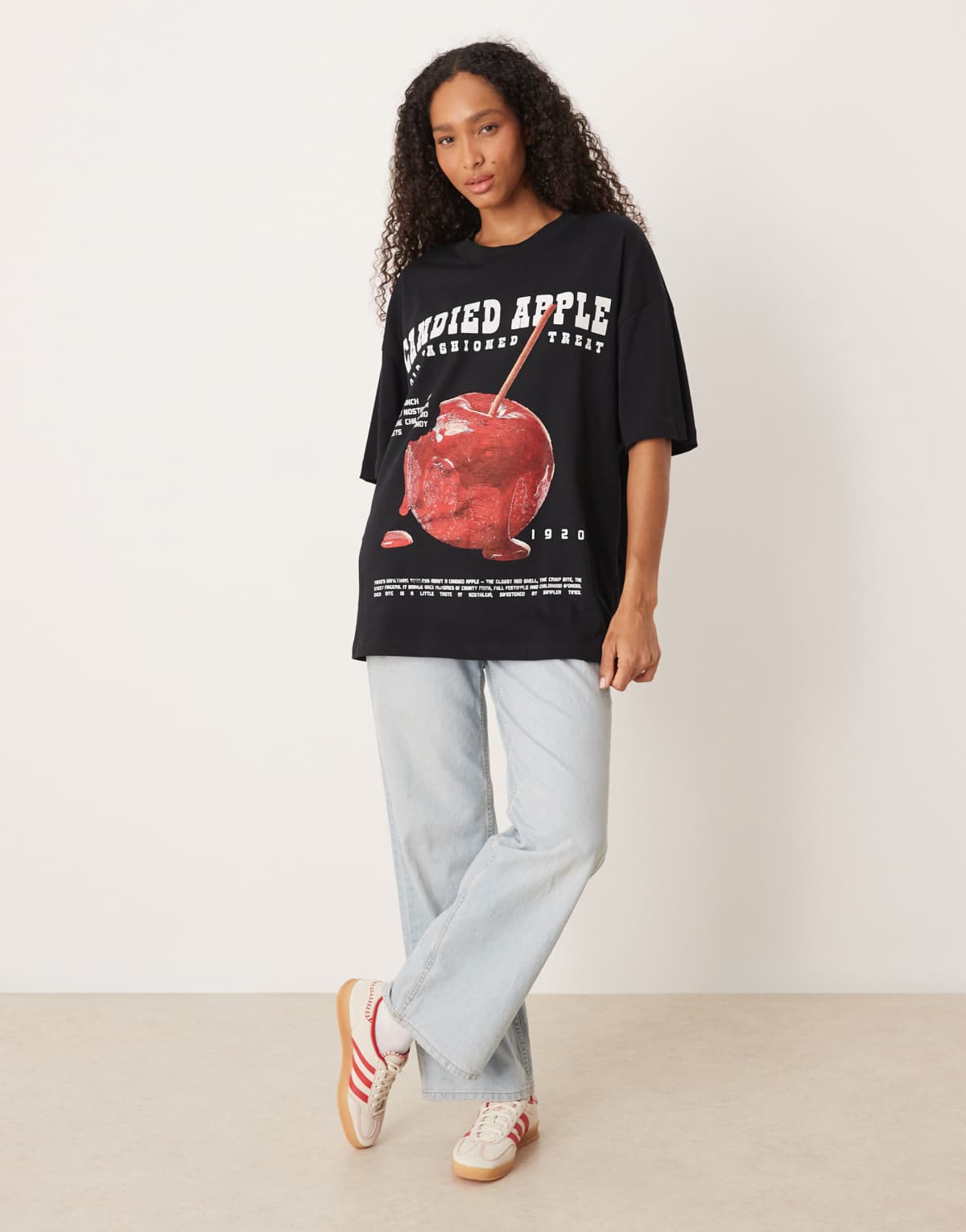 ASOS DESIGN oversized t-shirt with candied apple graphic in black