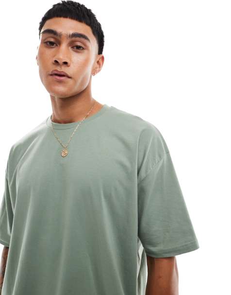 ASOS DESIGN oversized t-shirt with cartoon back print in green - view 1