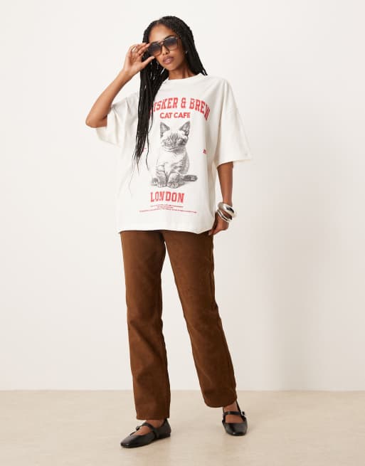 ASOS DESIGN oversized t-shirt with cat cafe graphic in cream