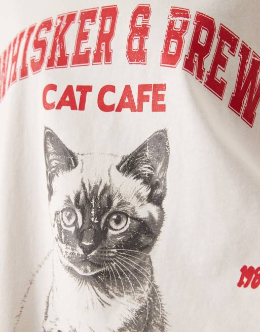 ASOS DESIGN oversized t-shirt with cat cafe graphic in cream