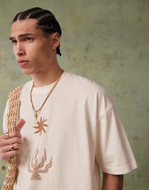 ASOS DESIGN oversized t-shirt with celestial graphic in cream - view 1