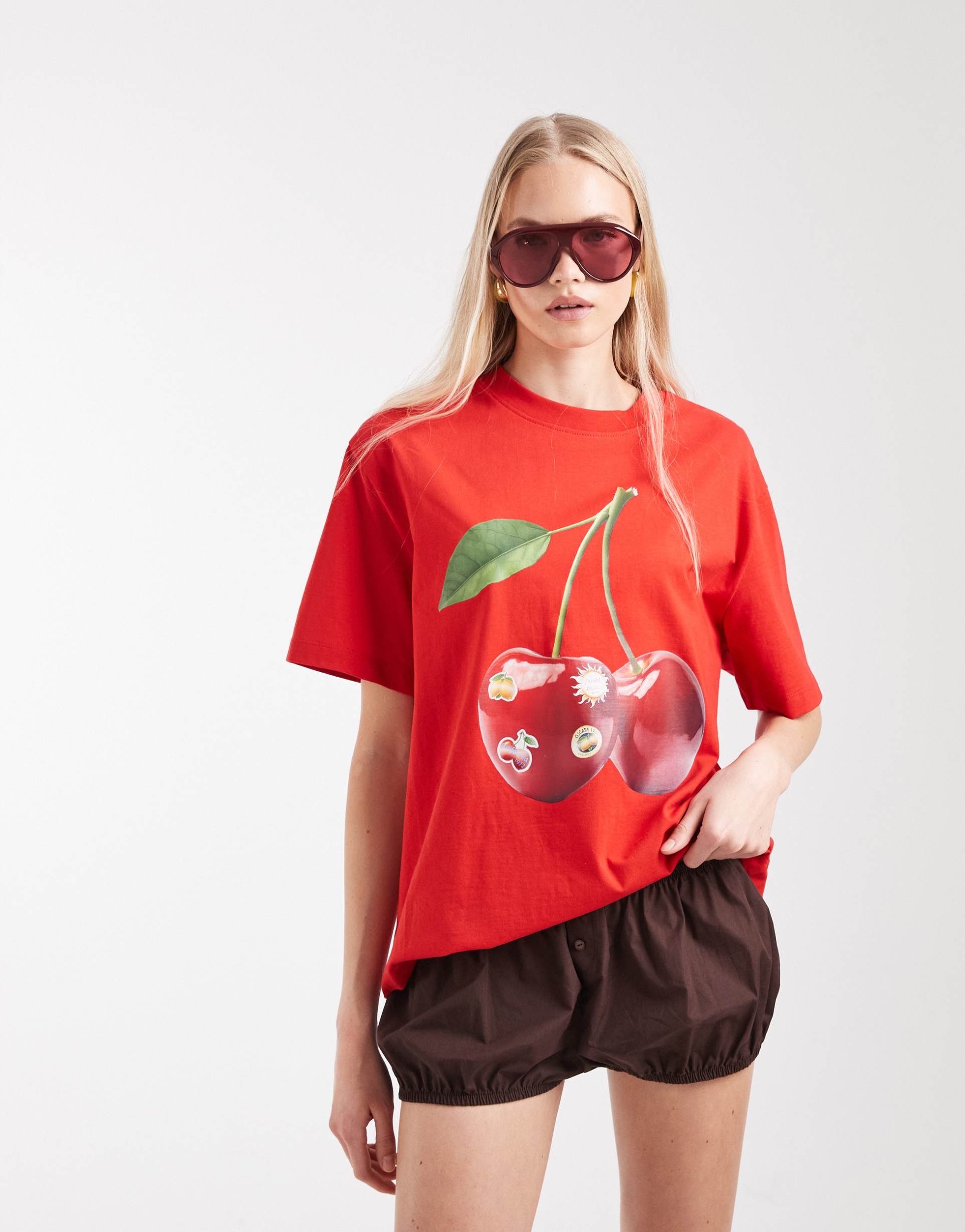 asos design oversized t-shirt with cherry sticker graphic in red