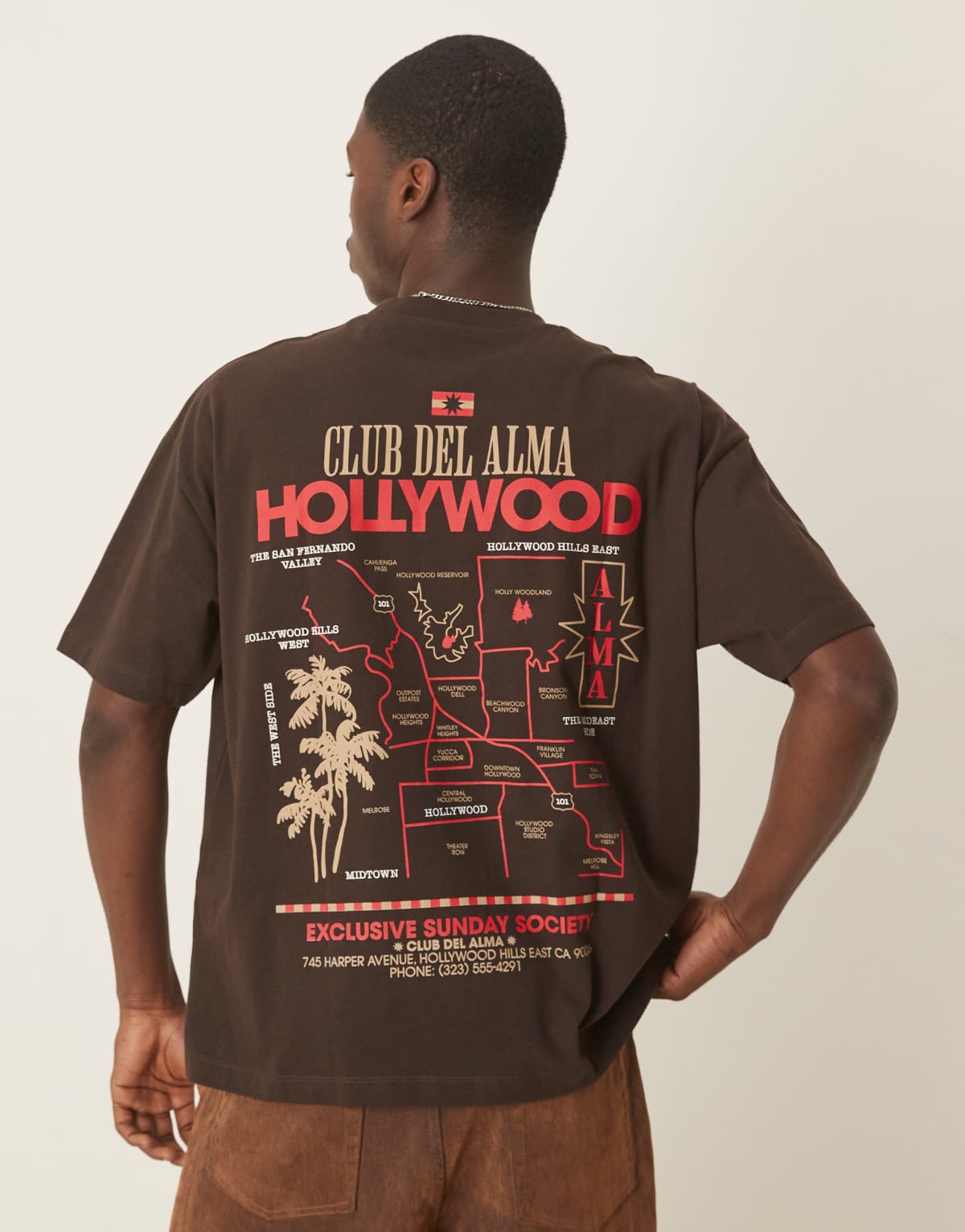 ASOS DESIGN oversized t-shirt with city graphic in brown