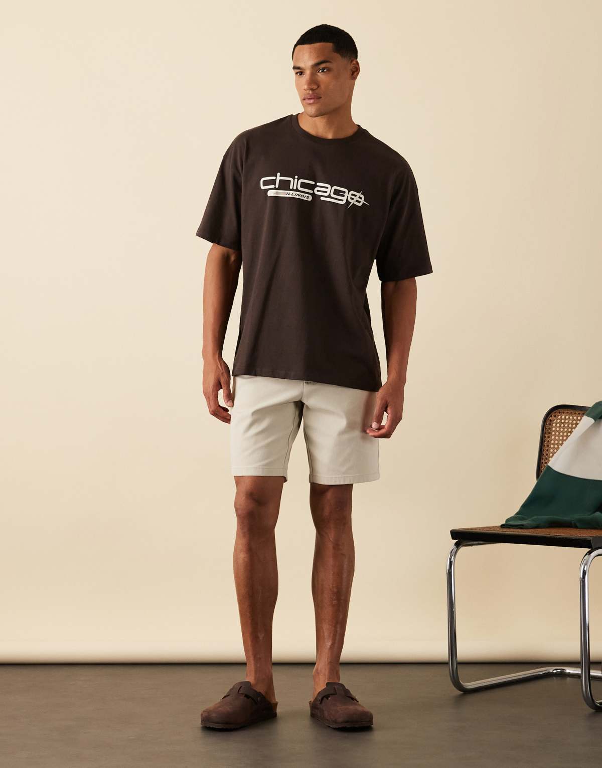 ASOS DESIGN oversized t-shirt with city graphic in brown