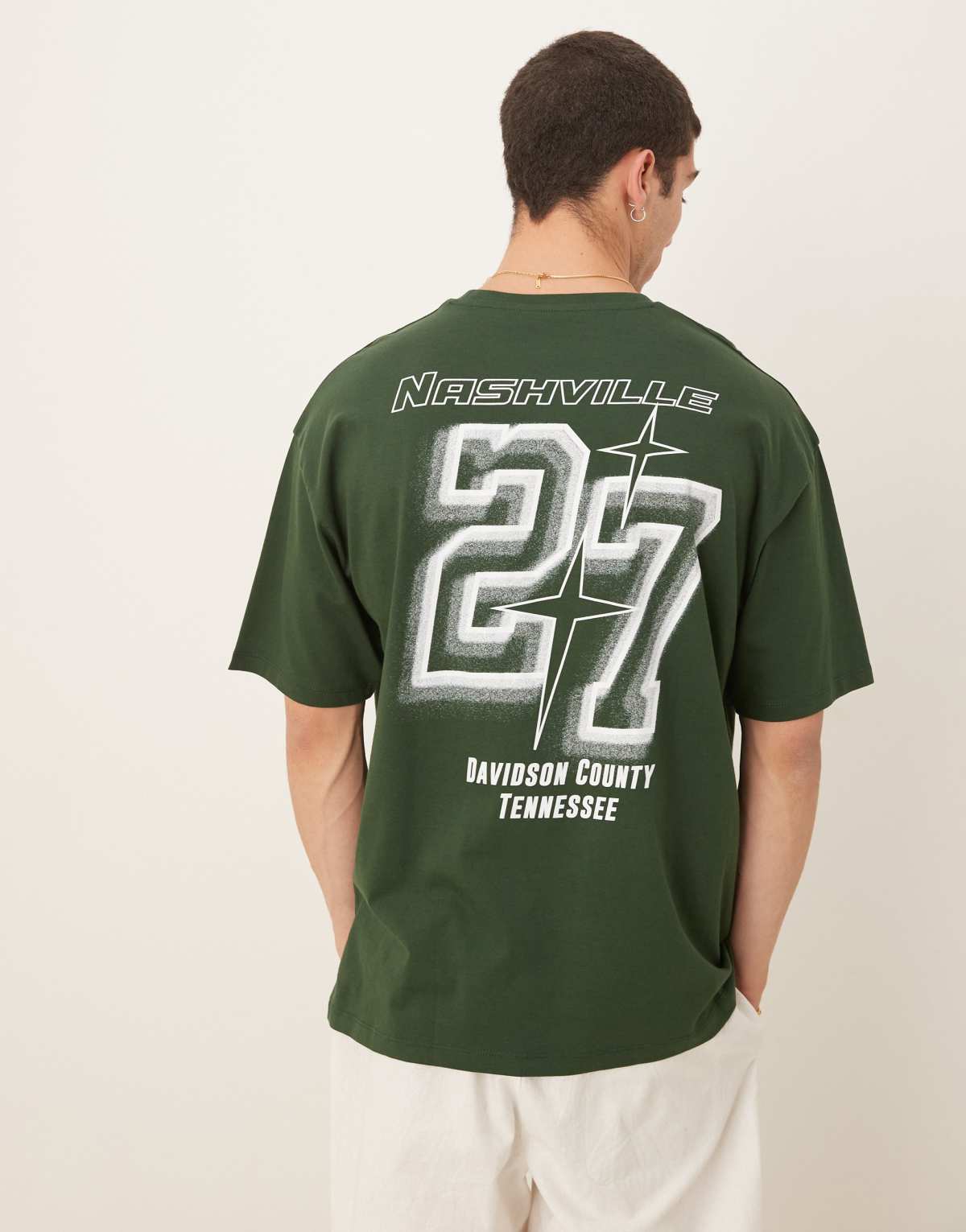 ASOS DESIGN oversized t-shirt with city graphic in dark green