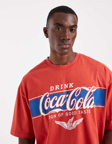 ASOS DESIGN oversized t-shirt with Coca Cola print in red - view 1