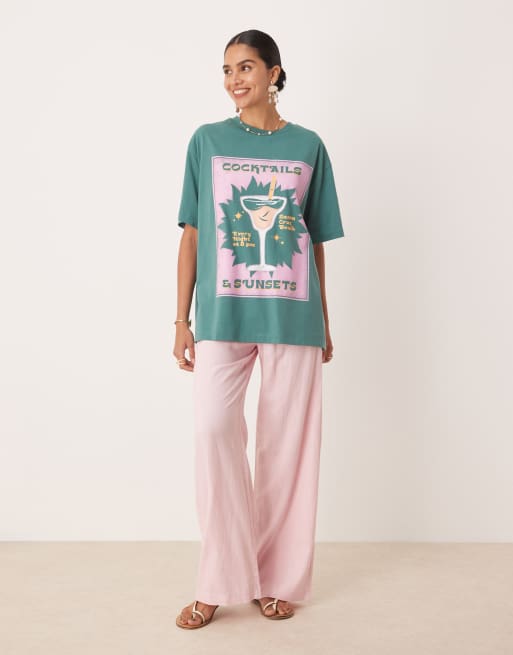 ASOS DESIGN oversized t-shirt with cocktail and sunset graphic in green