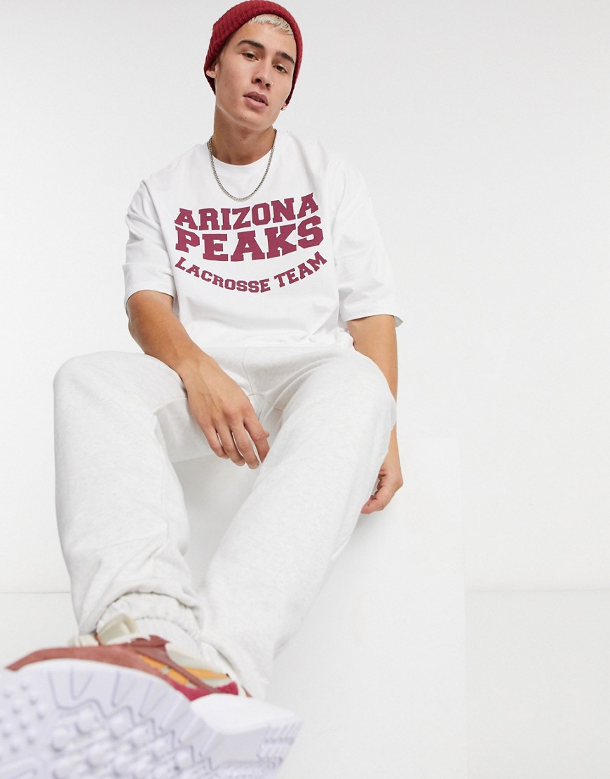 ASOS DESIGN oversized t-shirt with collegiate text style print in white