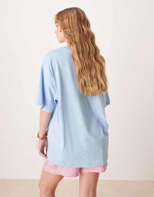 ASOS DESIGN oversized t-shirt with cote d'azur graphic in light blue