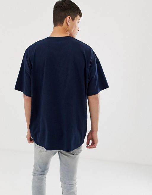 ASOS DESIGN oversized v-neck t-shirt in navy with New York city