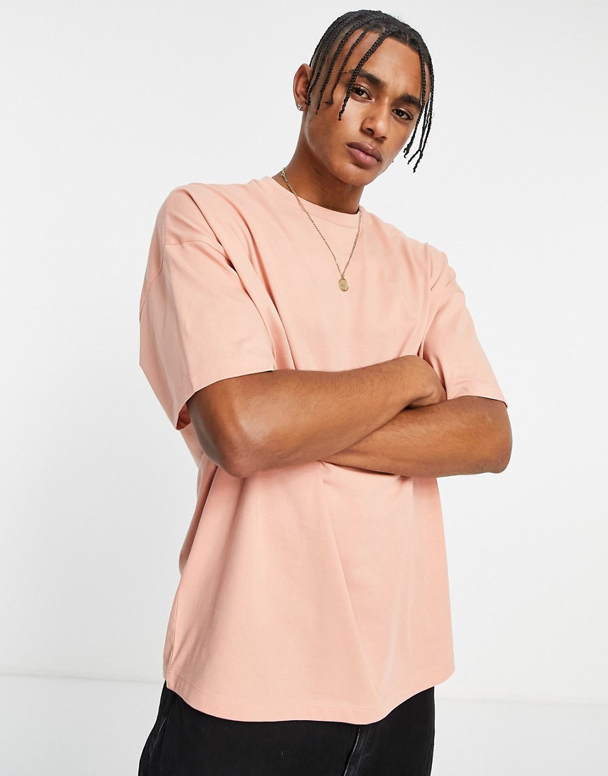 ASOS DESIGN oversized t-shirt with crew neck in washed pink