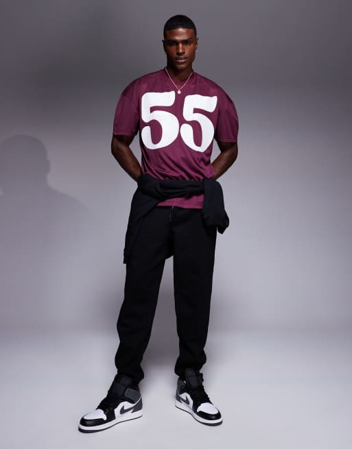 ASOS DESIGN oversized T-shirt with dropped shoulder and sports graphic in burgundy mesh