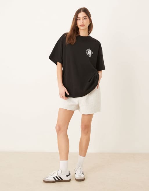 ASOS DESIGN oversized t-shirt with floral back graphic in black