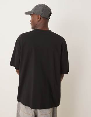 ASOS DESIGN oversized t-shirt with floral graphic in black