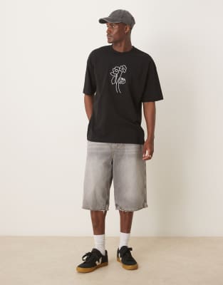 ASOS DESIGN oversized t-shirt with floral graphic in black