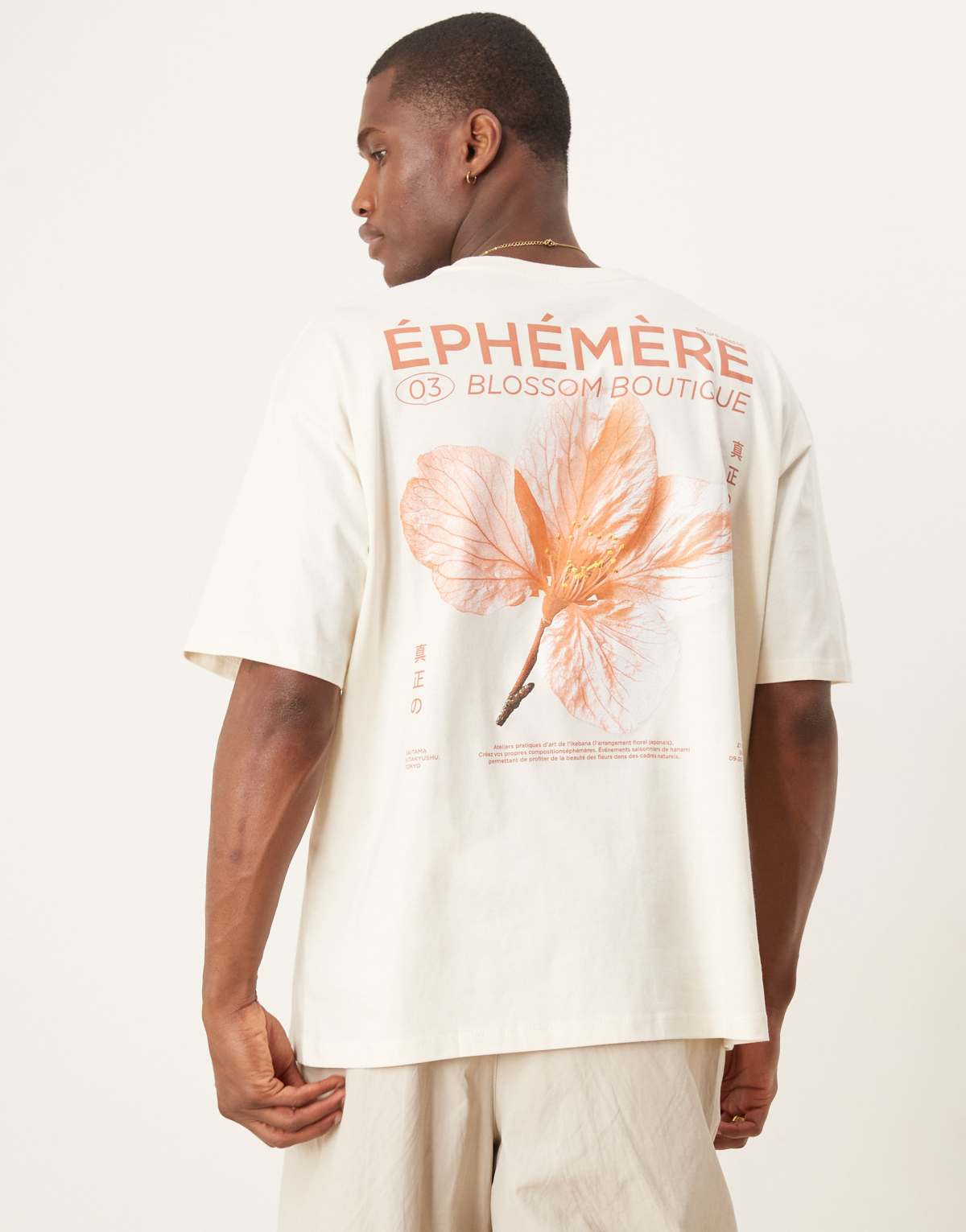 ASOS DESIGN oversized t-shirt with floral graphic in cream