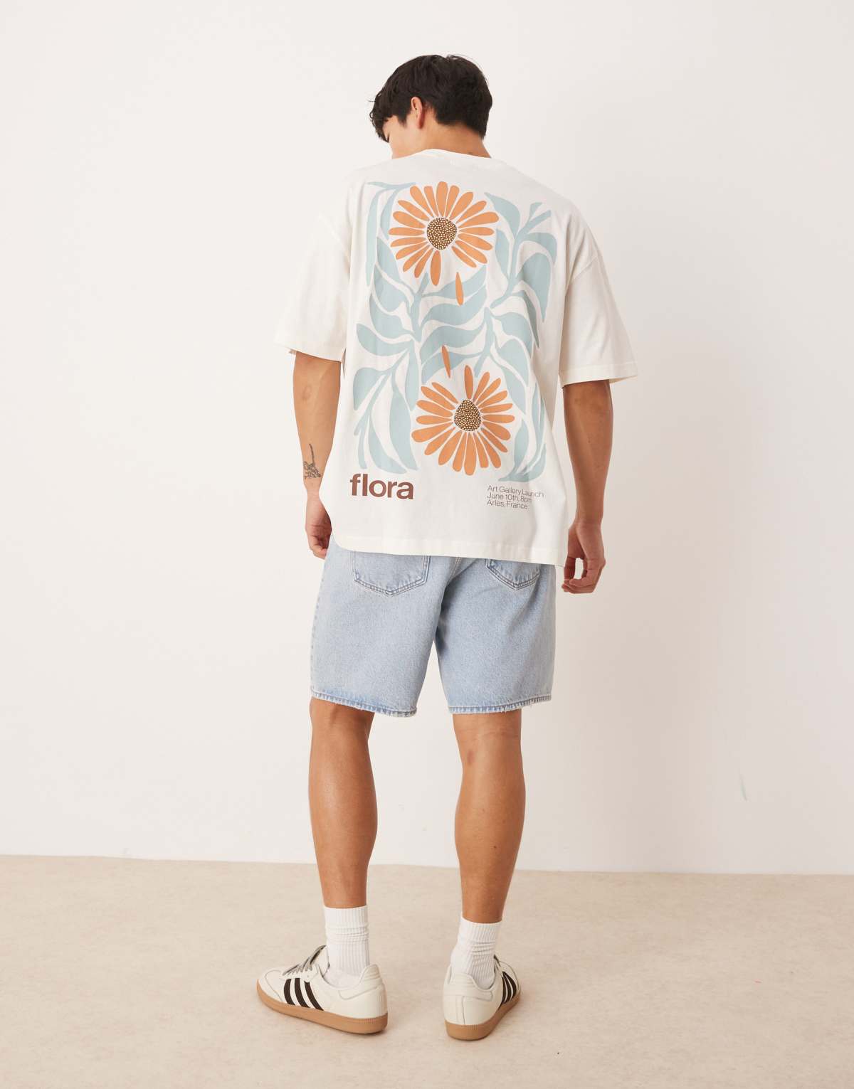 ASOS DESIGN oversized t-shirt with floral graphic in off white