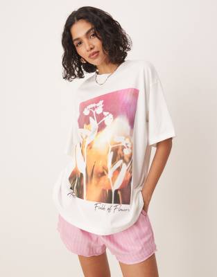 ASOS DESIGN oversized t-shirt with floral photographic in white