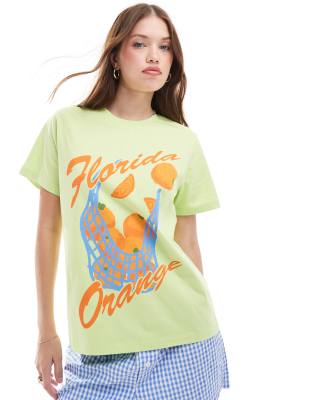 ASOS DESIGN oversized t-shirt with florida orange graphic in green-Multi