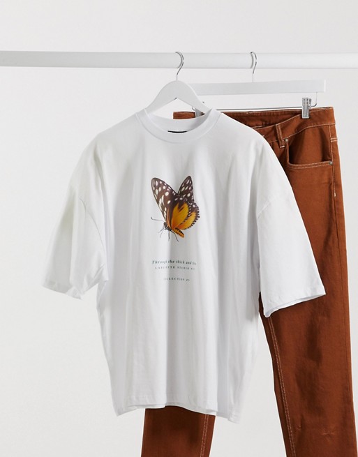 ASOS DESIGN oversized t-shirt with front butterfly & text print in white